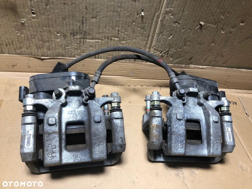 ZACISK HAMULCOWY TYŁ  HYUNDAI IONIQ 5  LEWY LUB PRAWY gwa!!! - 1