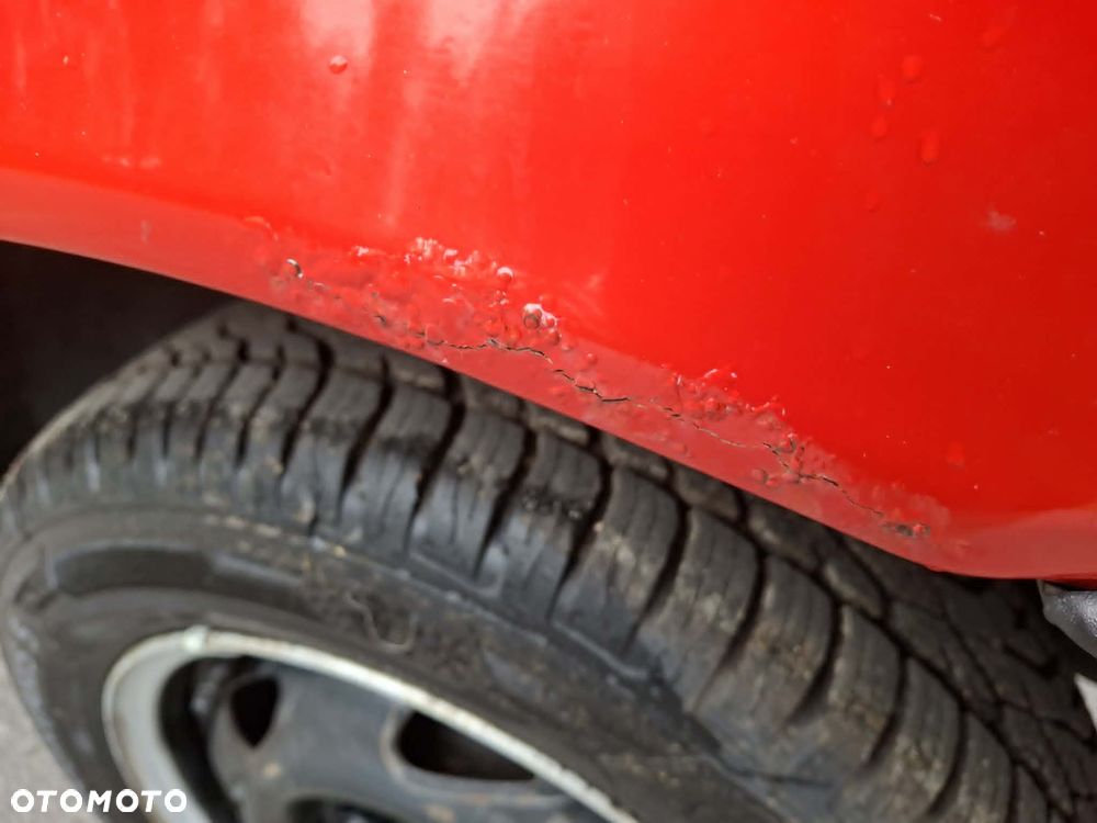 Ford Fiesta 1.4 Ghia - 10