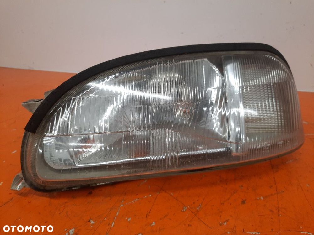 LIGIER AMBRA 99-06 REFLEKTOR LEWY PRZÓD 54532989 - 1