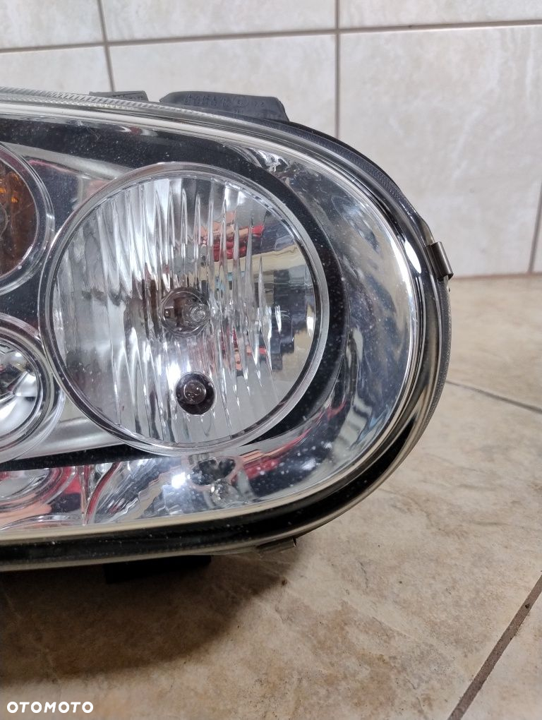 Volkswagen Golf 4 IV lampa reflektor prawy przód hella Europa wysyłka - 4