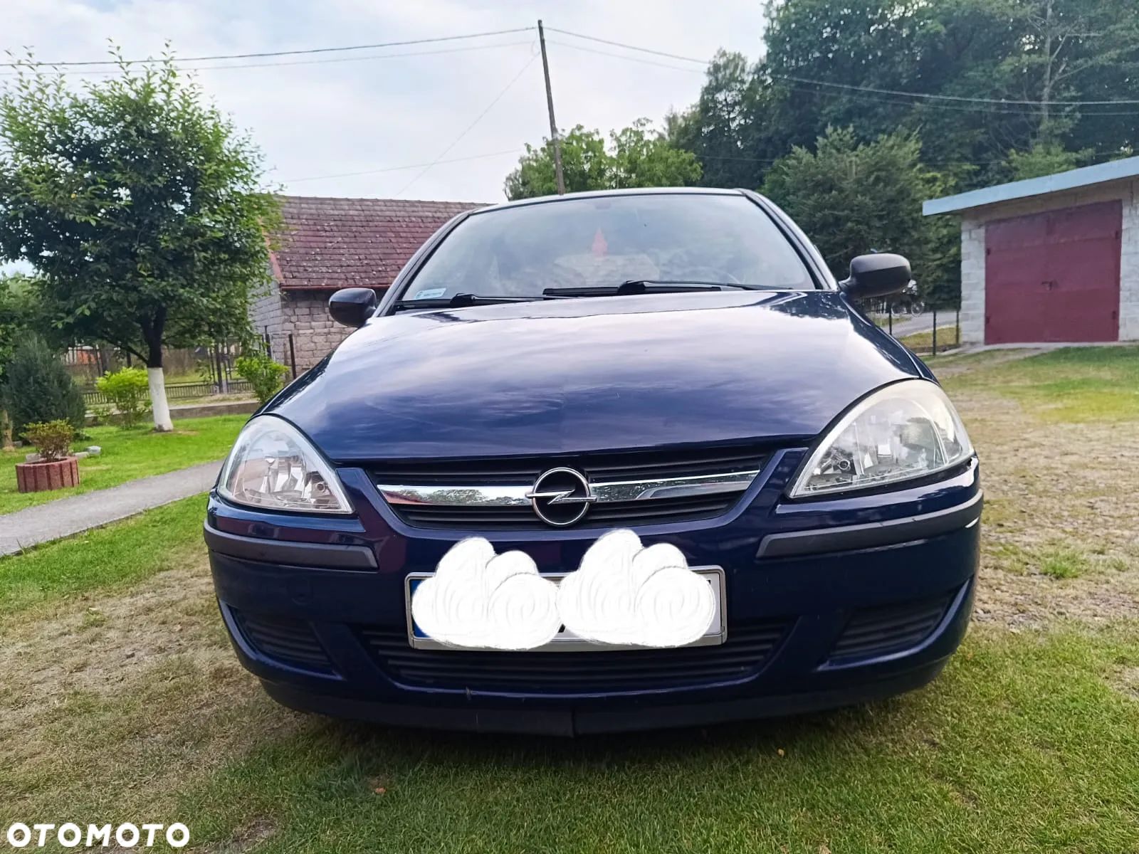 Opel Corsa 1.0 12V Cosmo - 1