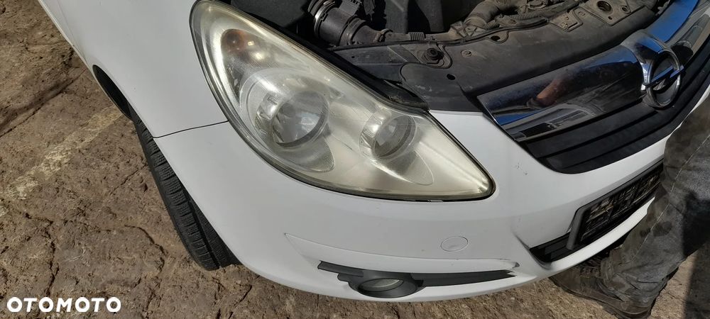 ZDERZAK tylny OPEL CORSA D - 11