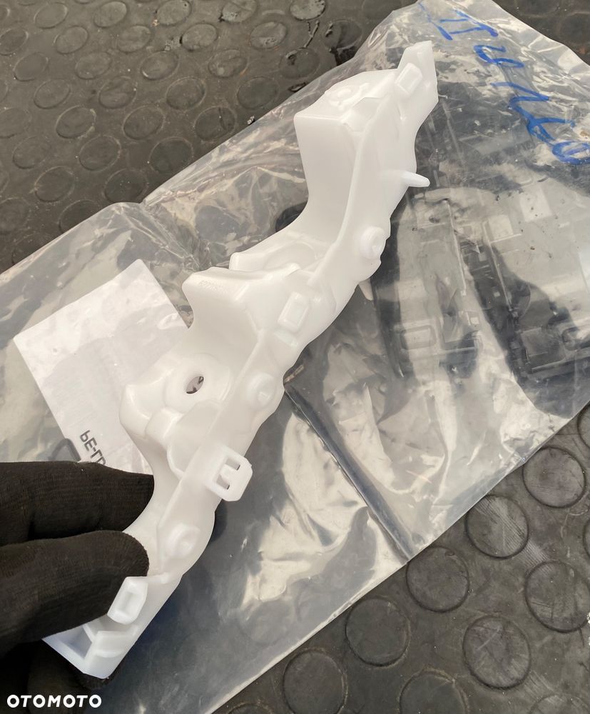 Dacia BIGSTER NOWY ORYGINALNY ! PRAWY ŚLIZG WSPORNIK MOCOWANIE ZDERZAKA BŁOTNIKA  PRZEDNIEGO PRAWY PRZEDNI PRZÓD W zderzak 622209270R - 3