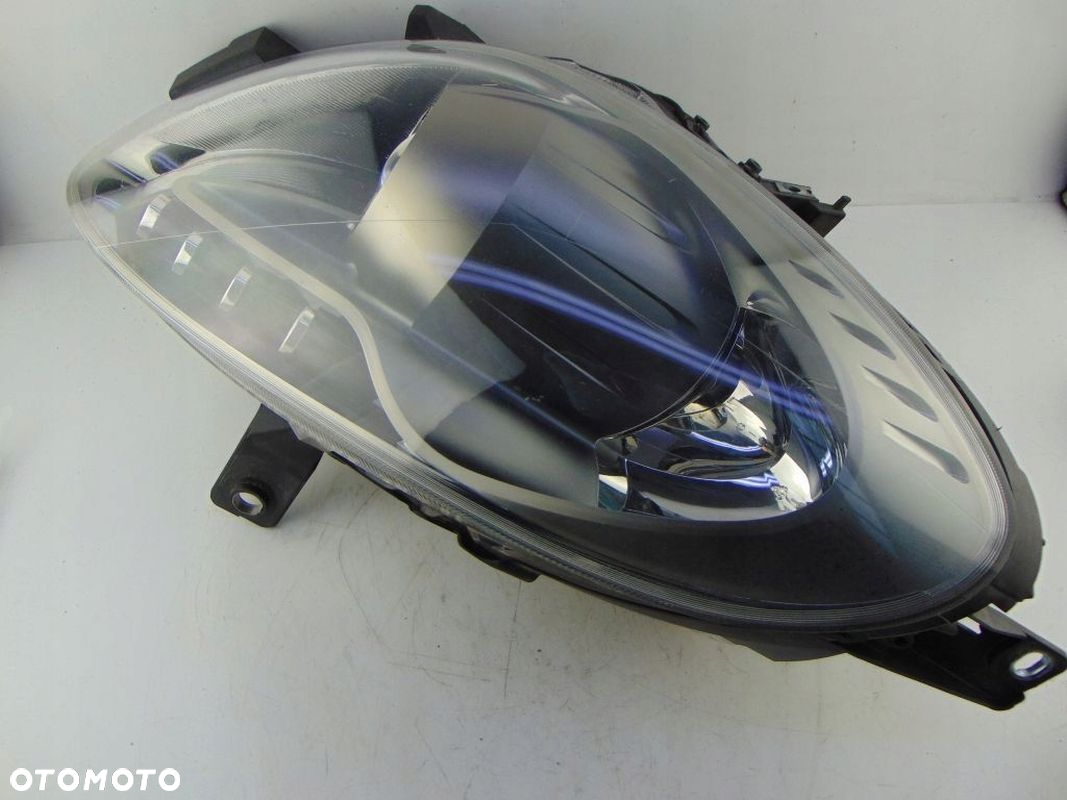 LAMPA REFLEKTOR PRAWY PRZÓD XENON ALFA ROMEO GIULIETTA (10-20) UK - 7