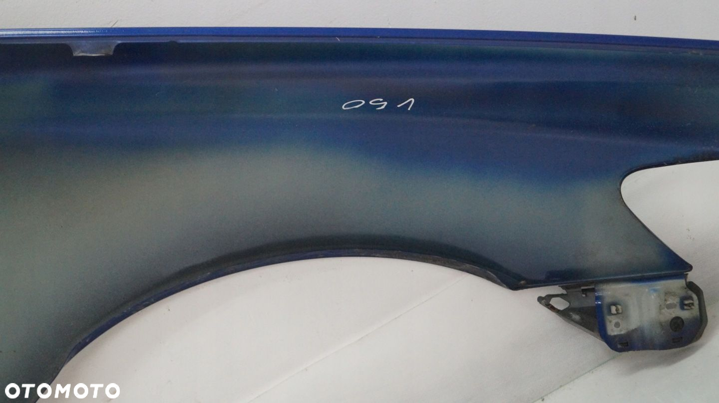 BŁOTNIK PRZEDNI LEWY VOLVO V50 - 12