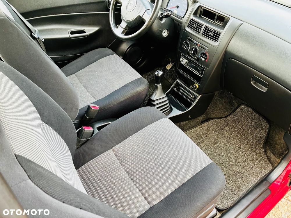 Daihatsu Cuore 1.0 Plus - 9