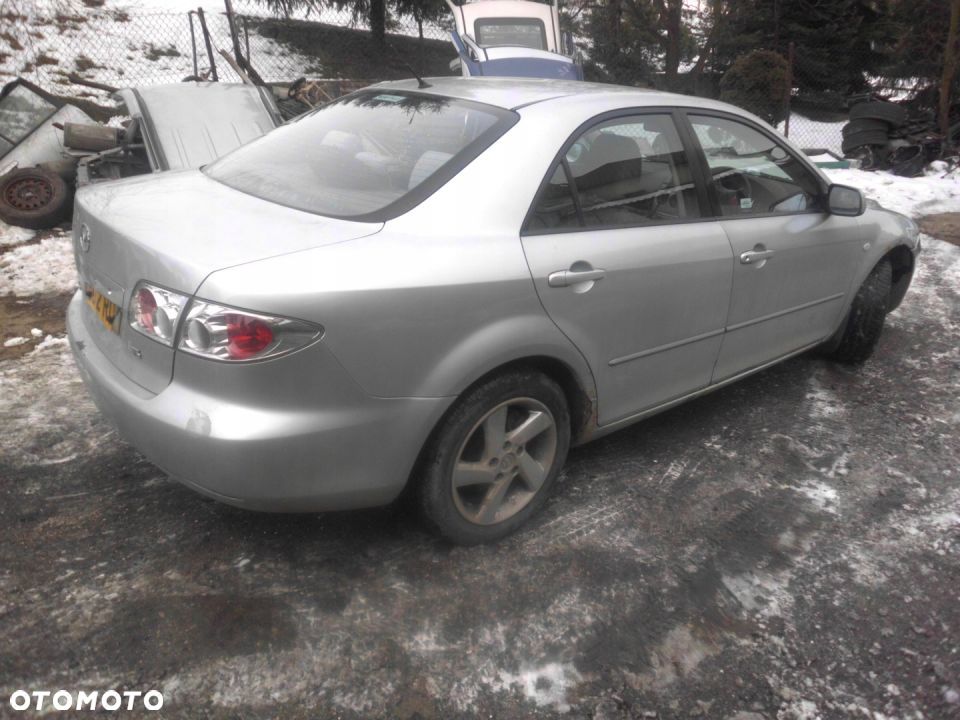 Mazda 6 02-07 Zacisk hamulcowy  Jarzmo lewy prawy - 9