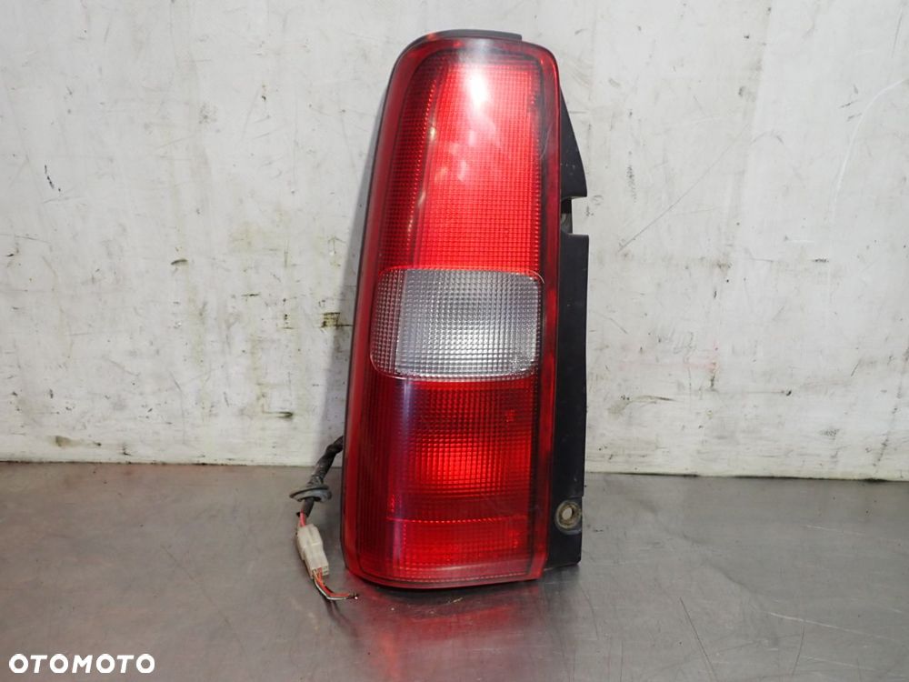 LAMPA LEWA TYLNA SUZUKI JIMNY III - 1