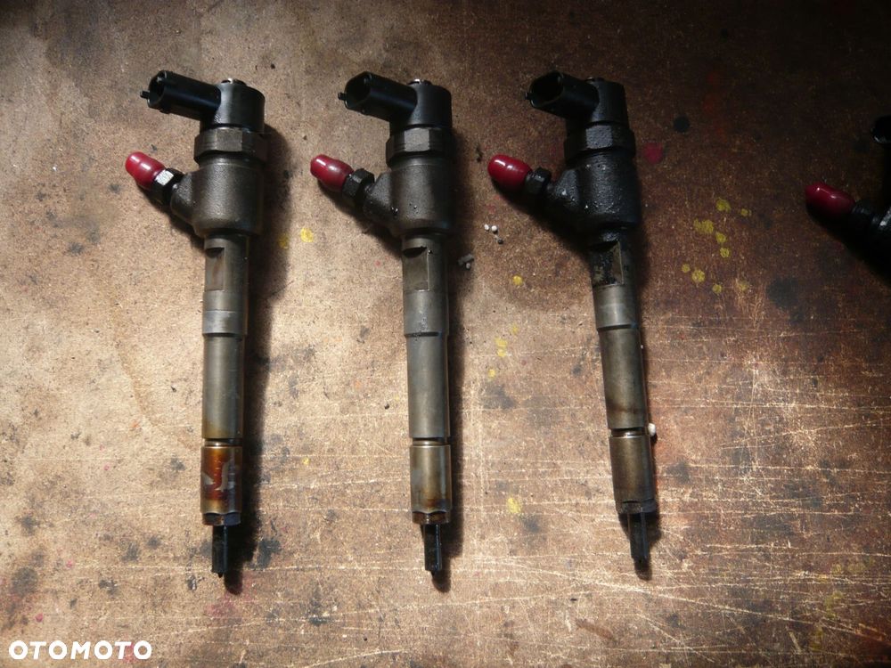 wtryskiwacz 0445110618 opel corsa e - 1