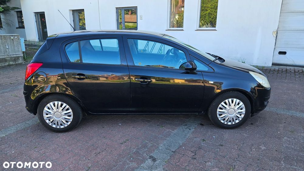 Opel Corsa 1.4 16V Enjoy - 9