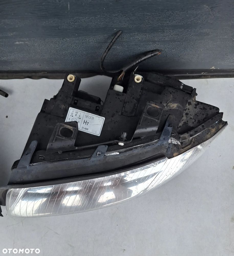 LAMPA LEWY PRZÓD AUDI A4/B6 EUR FIRMY TYC - 2