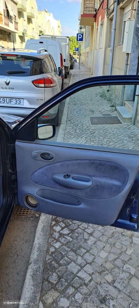 Ford Fiesta 1.25 Ghia - 9