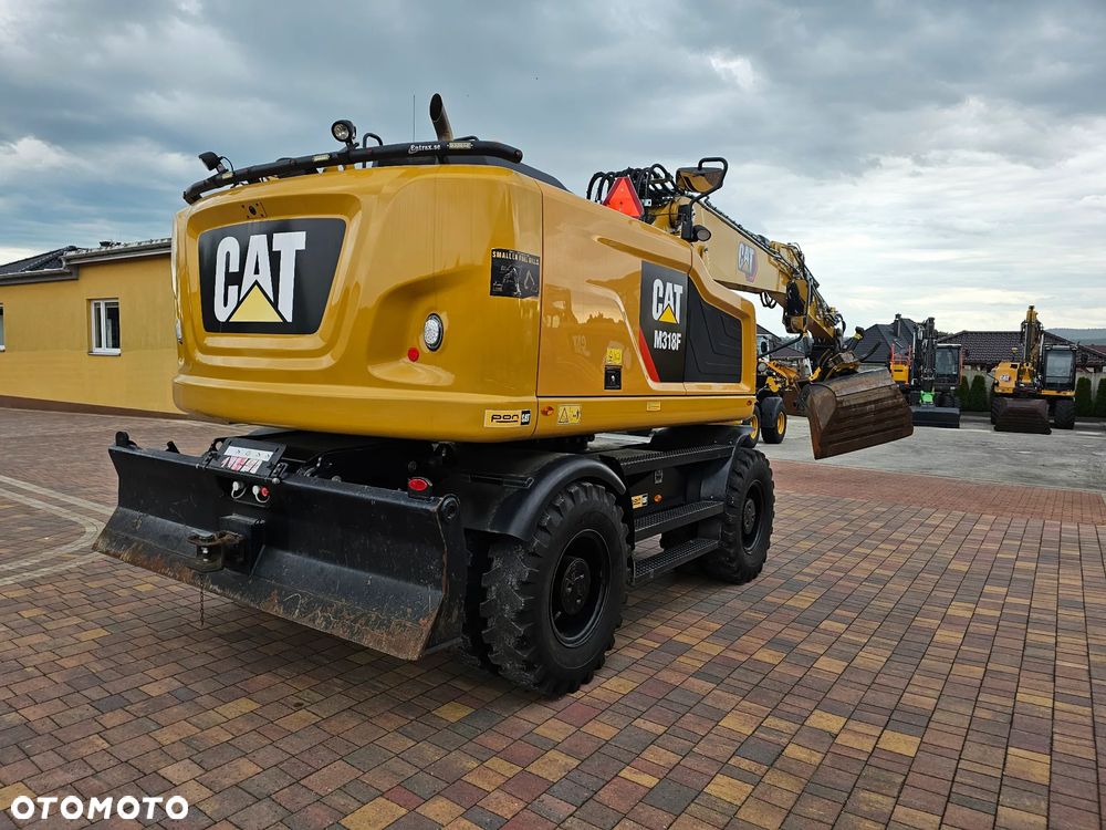 Caterpillar M 318 F - 40