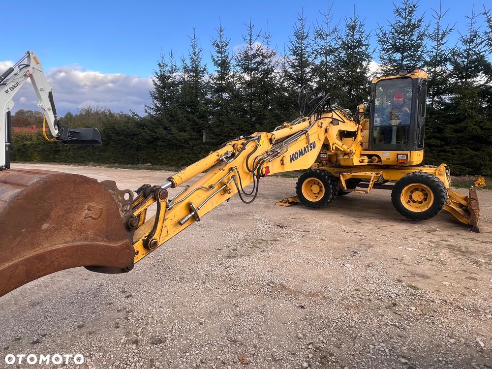 Komatsu Koparka kołowa KOMATSU 10ton PW98MR-8 4x4x4 plug podpory KLIMA 30km/h ramie Long 3xłamane skrętne 2012r bez DPF i ADBLUE 4cyl dodatk wyjścia hydr 51Kw 2osie skrętne pług stopy Cat TEREX Liebherr Wacker Pw 98 mr 8 11 prosto z importu - 33