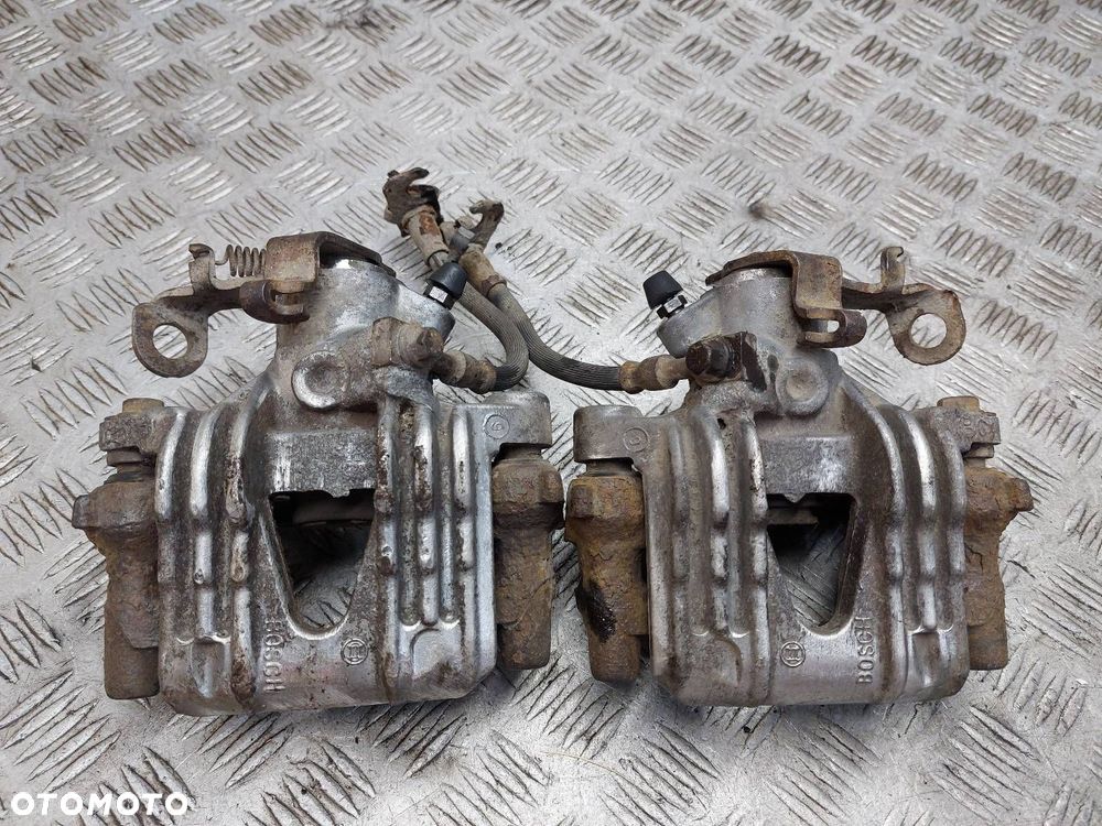 ZACISK HAMULCOWY LEWY + PRAWY TYŁ ASTRA G ZAFIRA A - 1