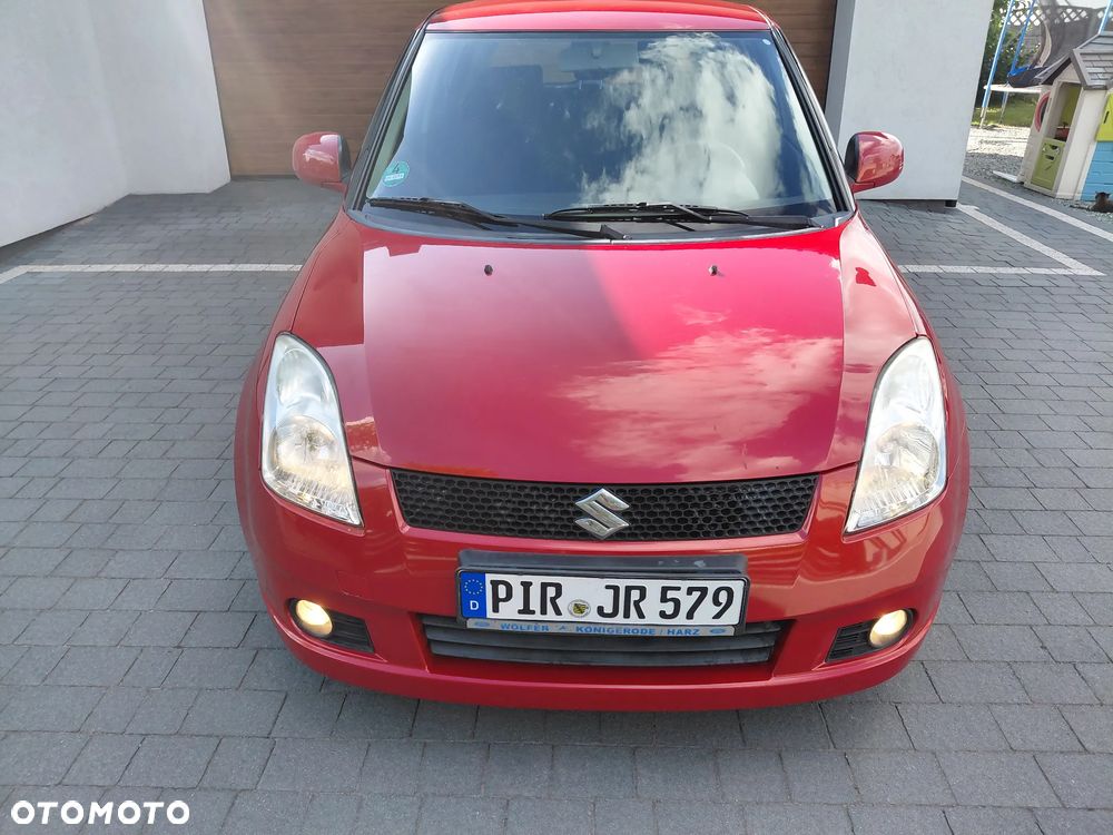 Suzuki Swift 1.3 Club - 7