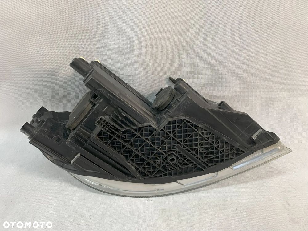 Skoda Octavia 2 II FL 08-12r Reflektor lewy lampa lewa Lift soczewka - 4