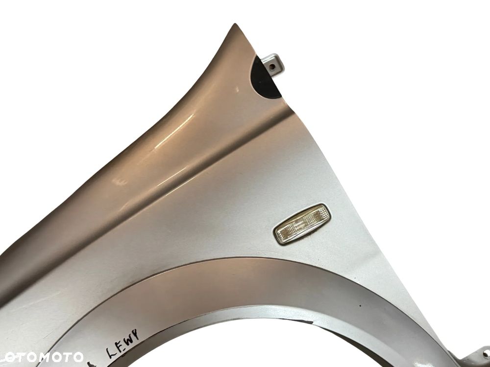 BŁOTNIK LEWY TATA INDICA SREBRNY ORYGINAŁ - 3