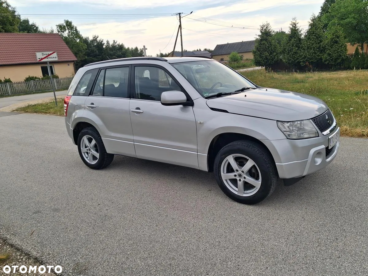 Suzuki Grand Vitara 2.0 Comfort + - 16