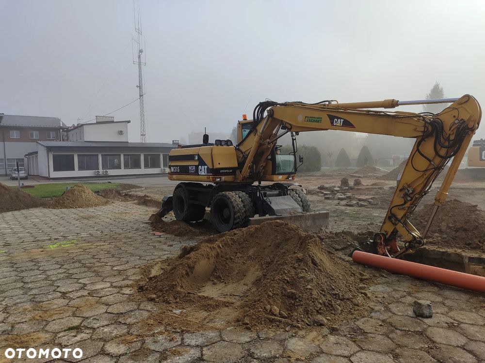 Caterpillar M315 - 1