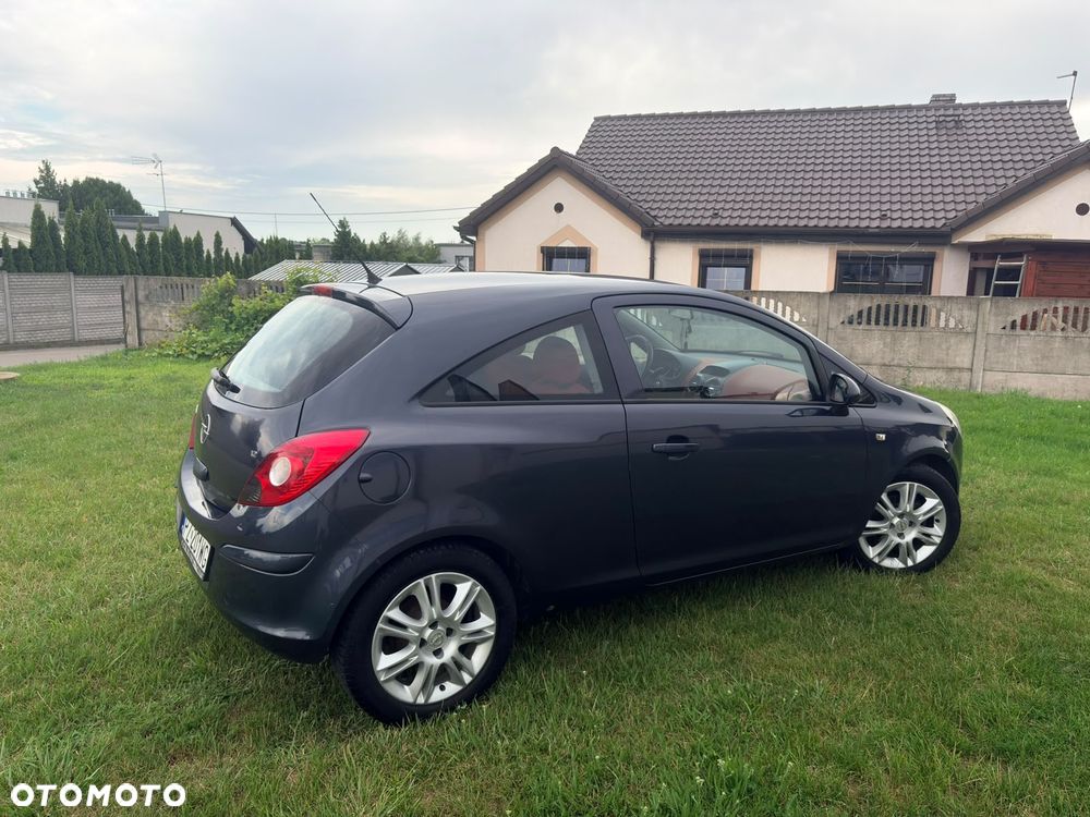 Opel Corsa 1.2 16V Enjoy - 11