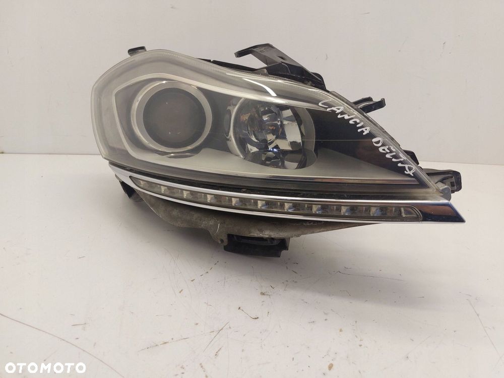 lancia delta iii 3 reflektor lampa prawa przód xenon europa - 1
