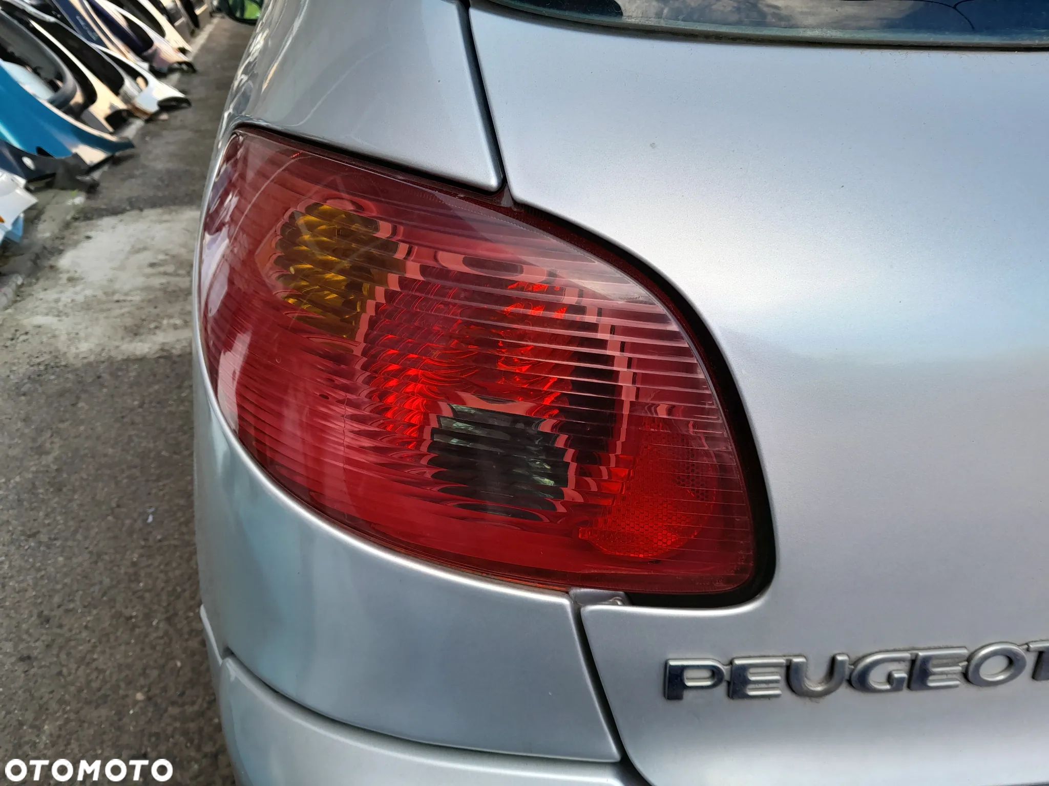 Lampa tylna lewa PEUGEOT 206 lift 03-09r. - 1