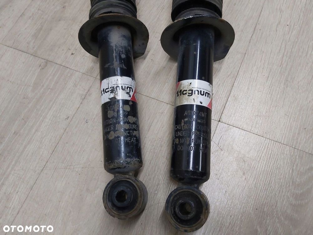 Nissan Primera P12 amortyzator tył lewy prawy komplet mcperson Magnum - 2