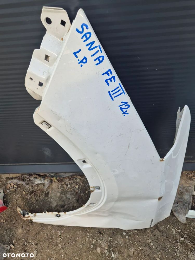 BŁOTNIK SANTA FE III 12r LEWY PRZÓD BIAŁY - 2