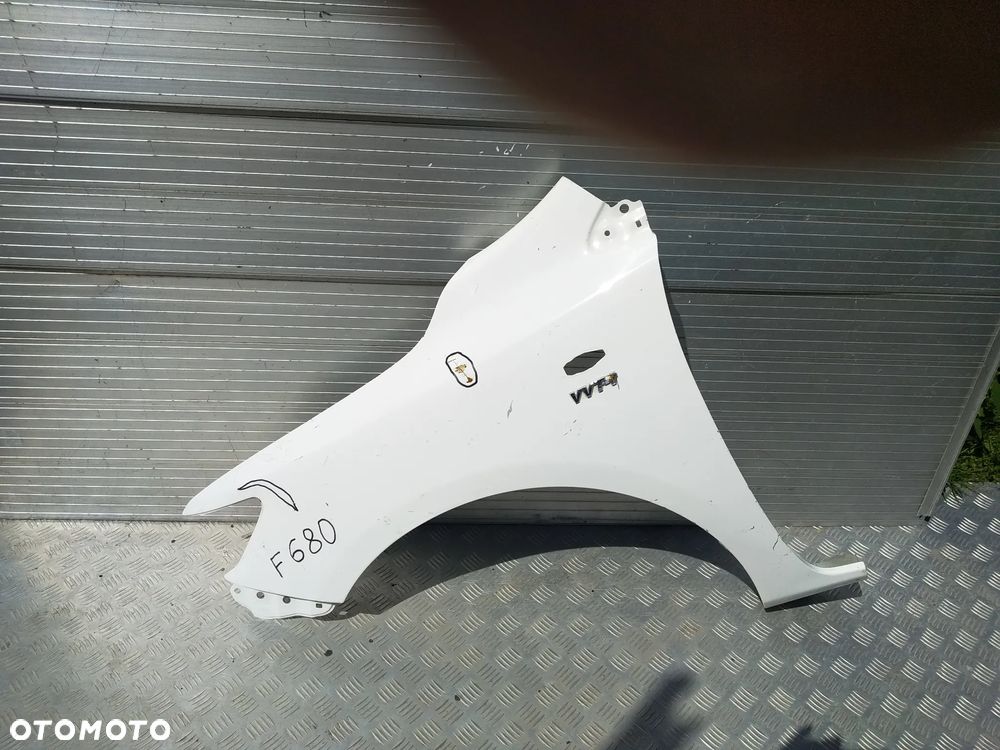 F354/F357/F371/F680/F748/H309/H327/H351/H501 BŁOTNIK LEWY TOYOTA COROLLA E15 SEDAN - 2