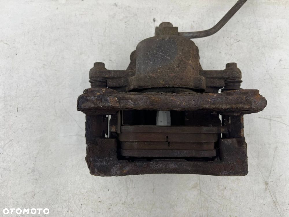 Zacisk hamulcowy Chrysler PT Cruiser 00-10r. 2.2 CRD prawy przedni jarzmo prawy przód - 7