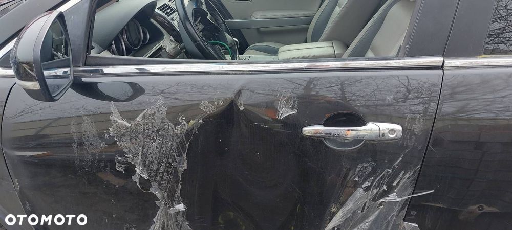 ZAMEK DRZWI LEWY PRZÓD MAZDA CX-9 I LIFT EUROPA - 1