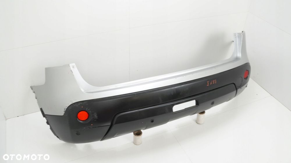 ZDERZAK TYŁ TYLNY NISSAN QASHQAI J10 06-09R PDC - 2