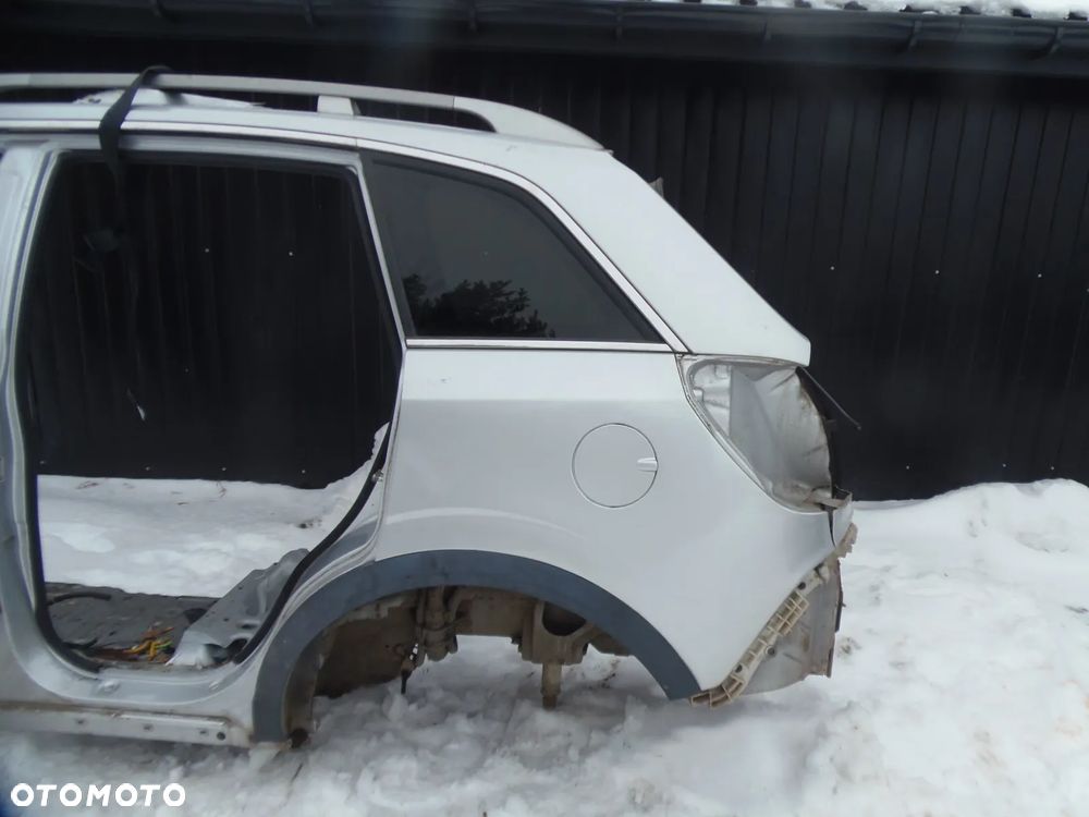 BŁOTNIK ĆWIARTKA TYŁ LEWY OPEL ANTARA LIFT 92U - 1