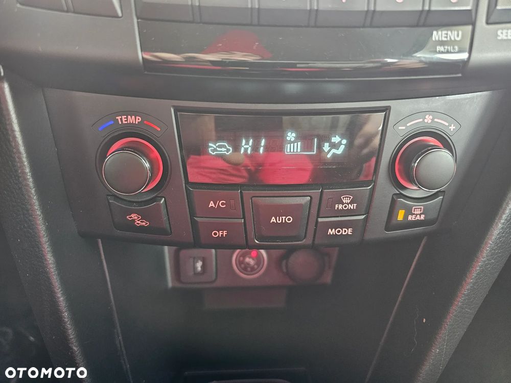 Suzuki Swift 1.2 4x4 Club - 12