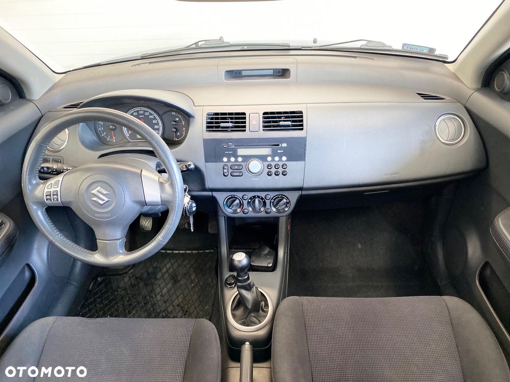 Suzuki Swift 1.3 Club - 11