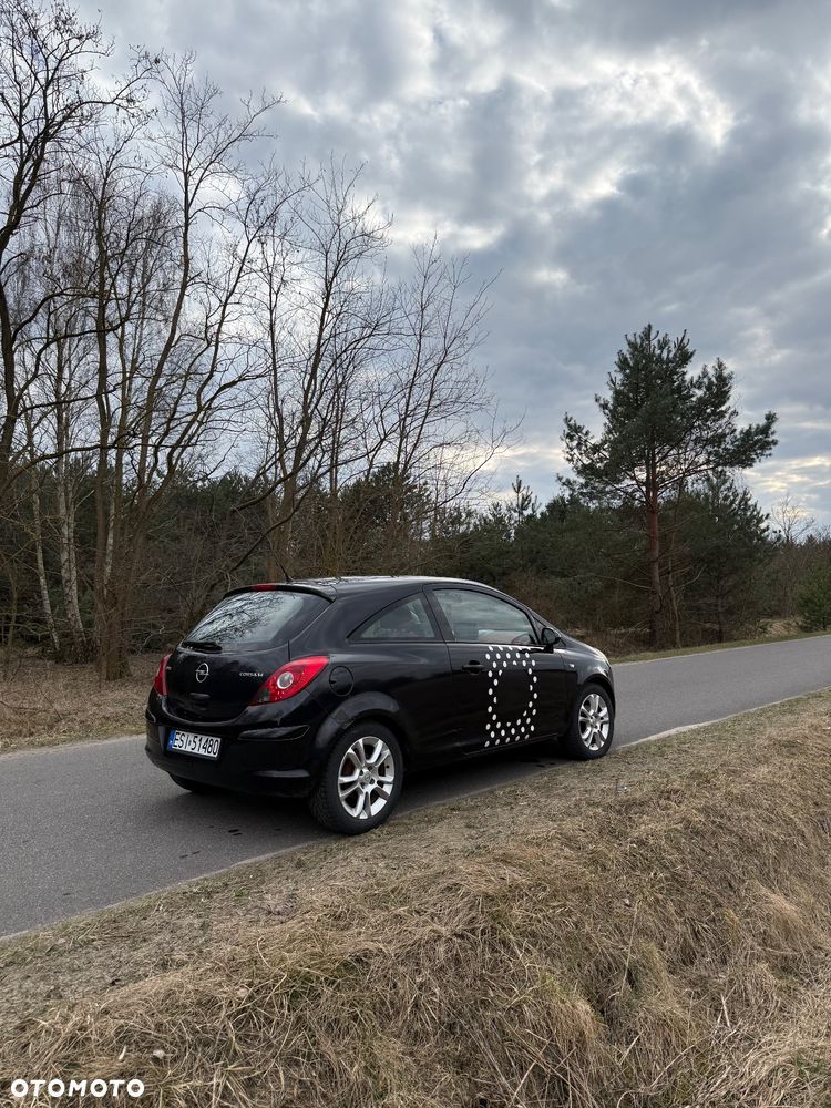 Opel Corsa 1.4 16V Cosmo - 5