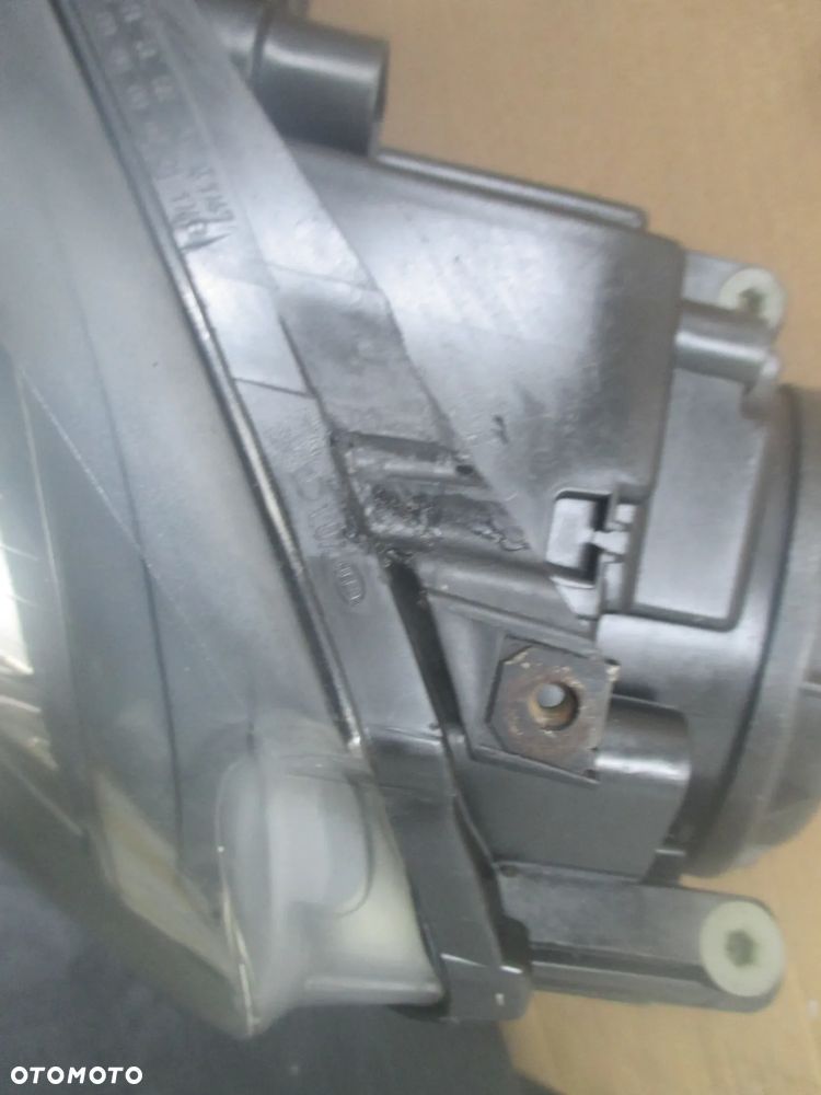 lampa lewa Golf V JETTA Hella Europa - 2