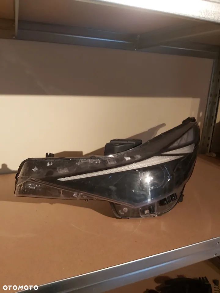 Lampa przednia lewa Hyundai Elantra VII soczewka 92101AA000 - 2