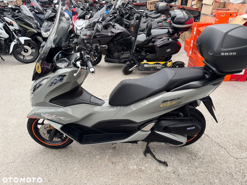 Mondial HPS 125 - 4