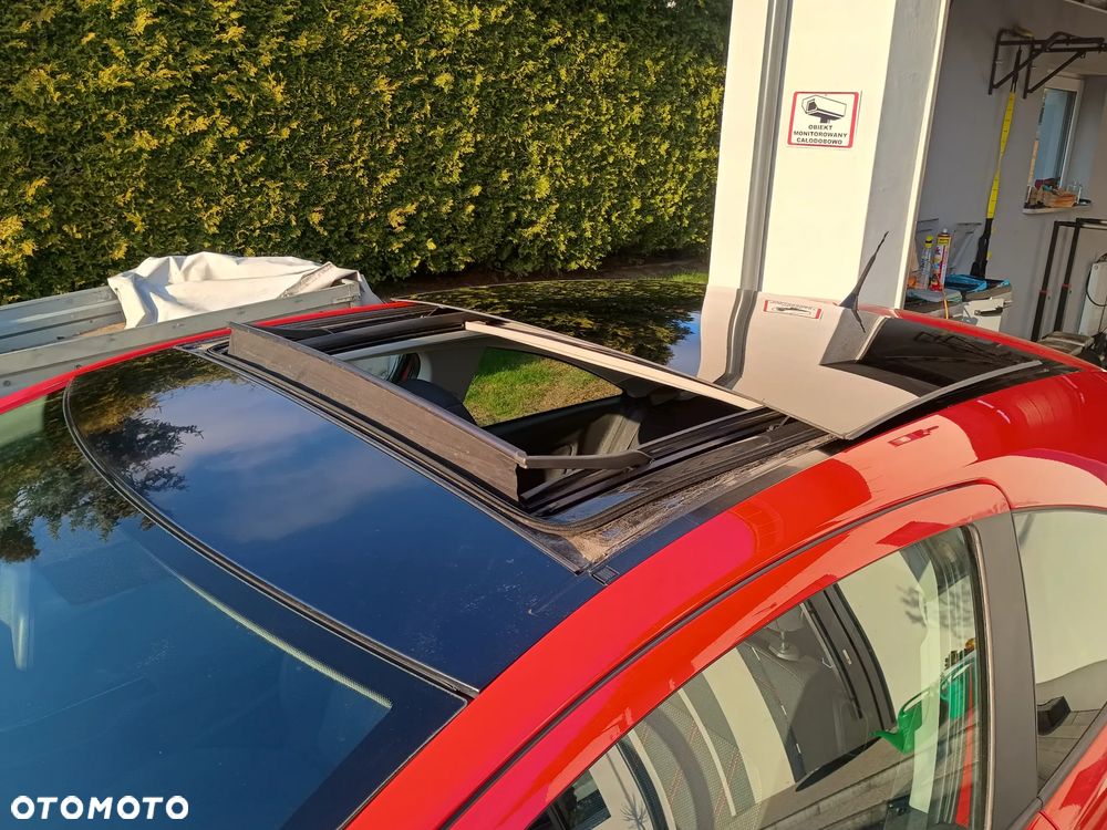 Opel Corsa 1.4 16V Sport - 11