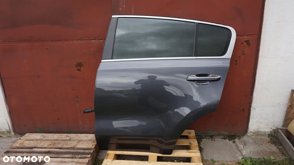 Kia Sportage IV drzwi lewy tyl kolor BE - 1