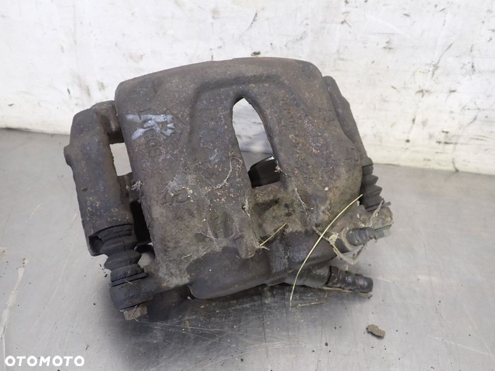 ZACISK HAMULCA PRAWY PRZÓD RENAULT TRAFIC II 1.9 - 1