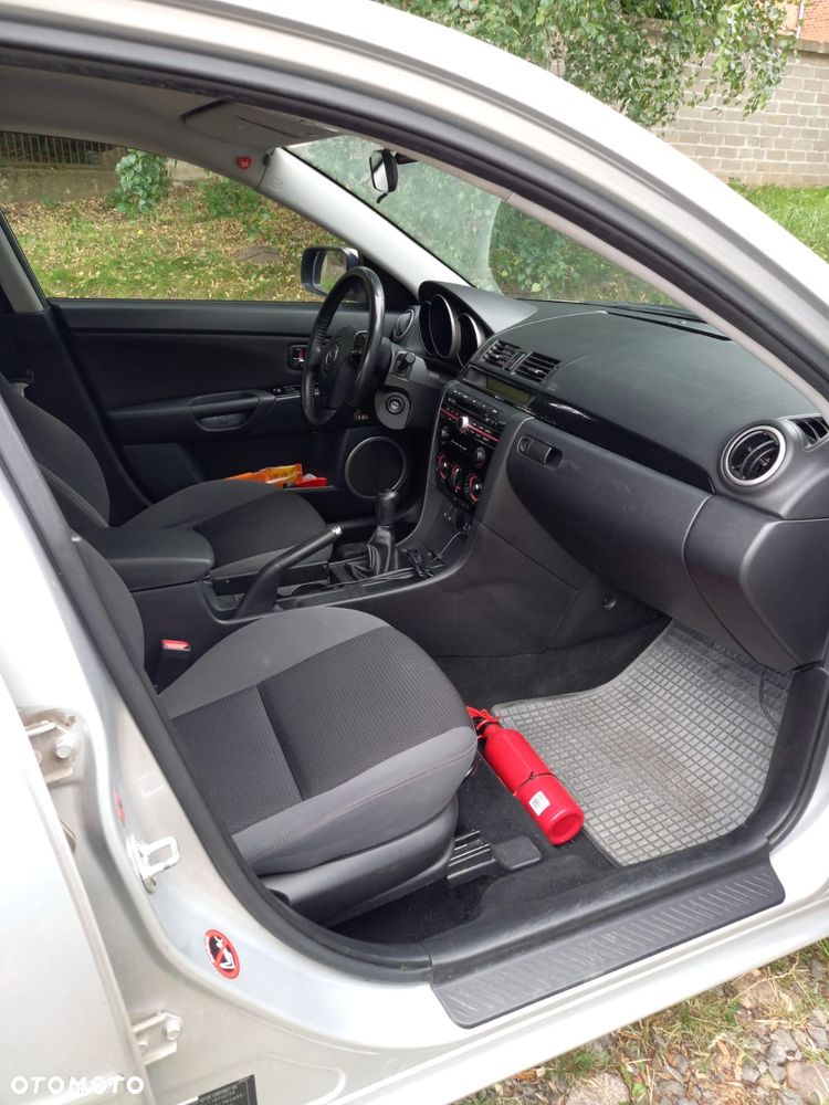 Mazda 3 1.6 Exclusive + - 5