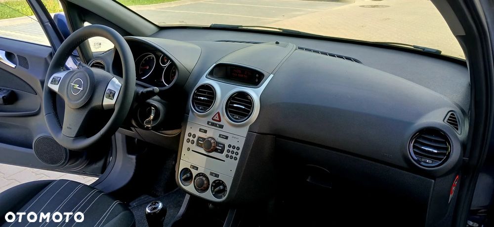 Opel Corsa 1.2 16V Enjoy - 26