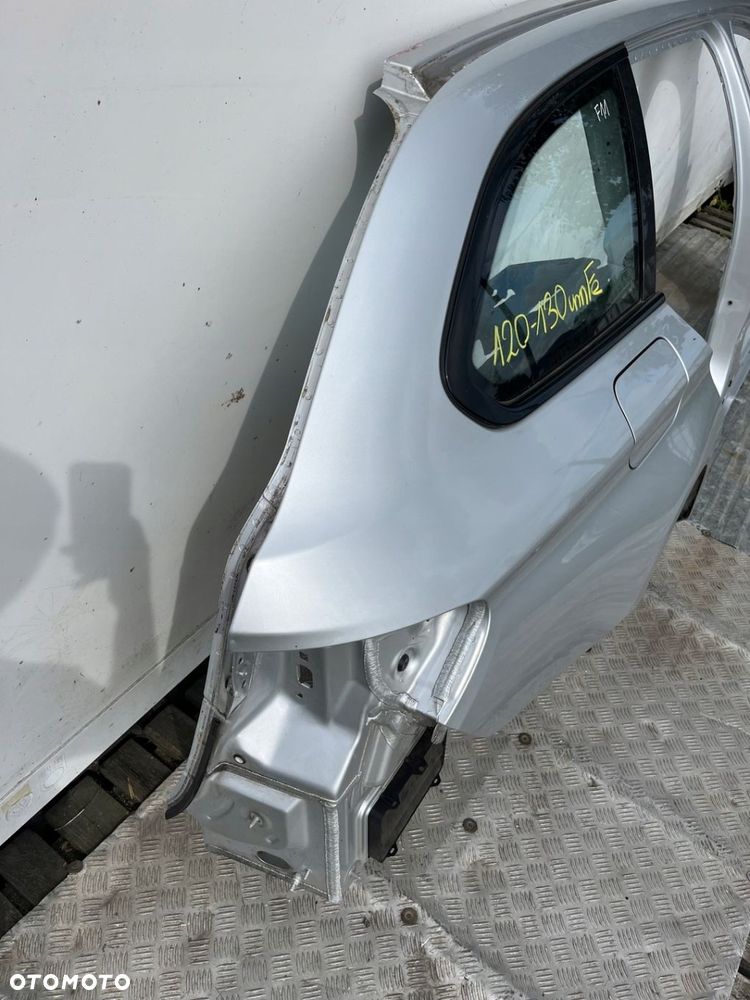 Blotnik cwiartka szyba poszycie prawy tyl BMW F11 354 120-130 umFe LADNY - 6