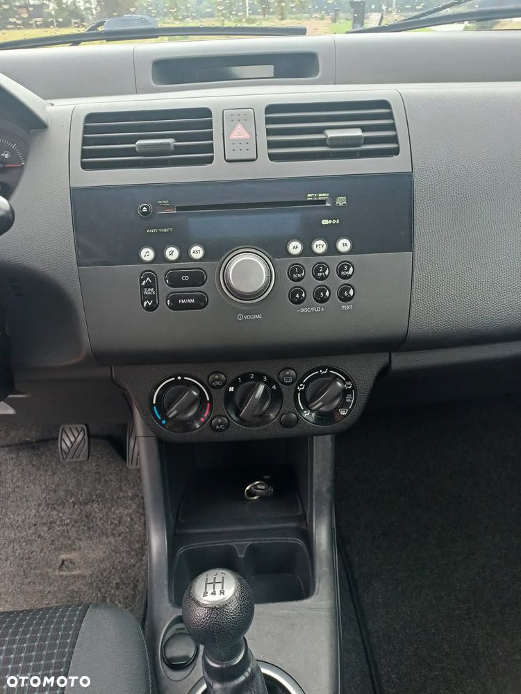 Suzuki Swift 1.3 Club - 9
