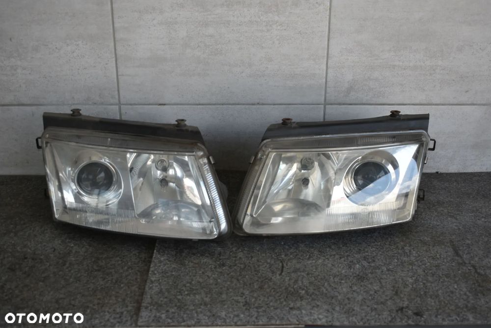 LAMPA LAMPY PRZÓD PASSAT B5 XENON HELLA - 1