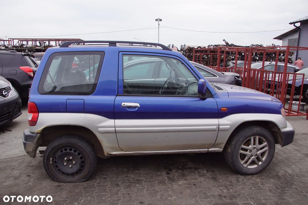 Auto na części - Mitsubishi Pajero Pinin 2.0 GDI 129 KM 4G94 V5M21 TH9B 2003R Silnik Skrzynia Drzwi Maska Błotnik Klapa Zderzak Lampa Lusterko Klamka Szyba Deska Kokpit Sterownik Moduł Czujnik Licznik Wyświetlacz Panel Kierownica - 6