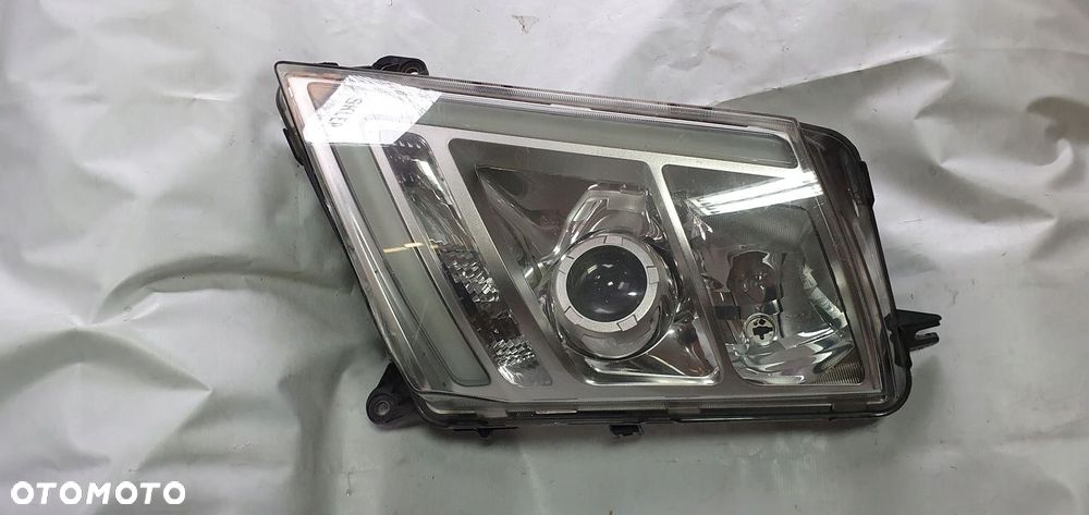 VOLVO FH4 LAMPA LEWA BI XENON 21221138 - 1